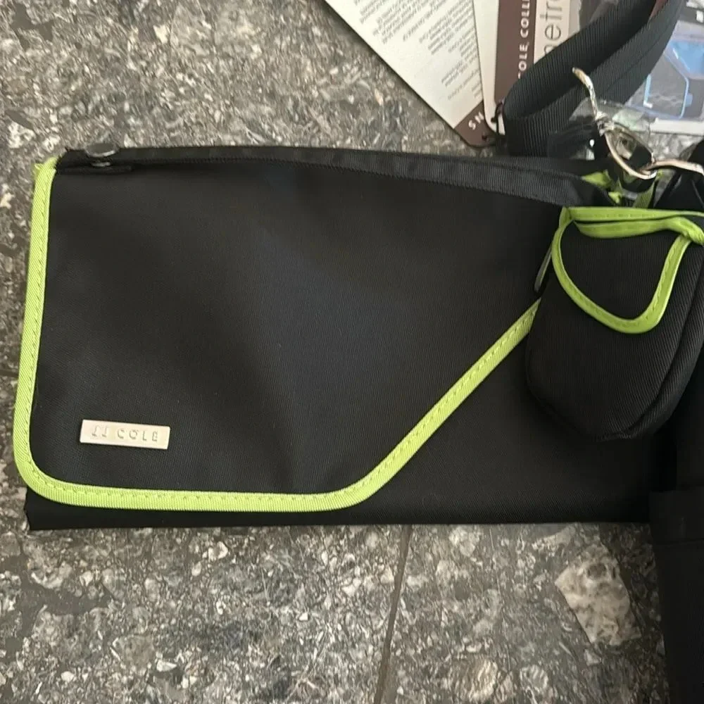 JJ Cole black/lime/gray pattern multi compartment adjustable strap diaper bag